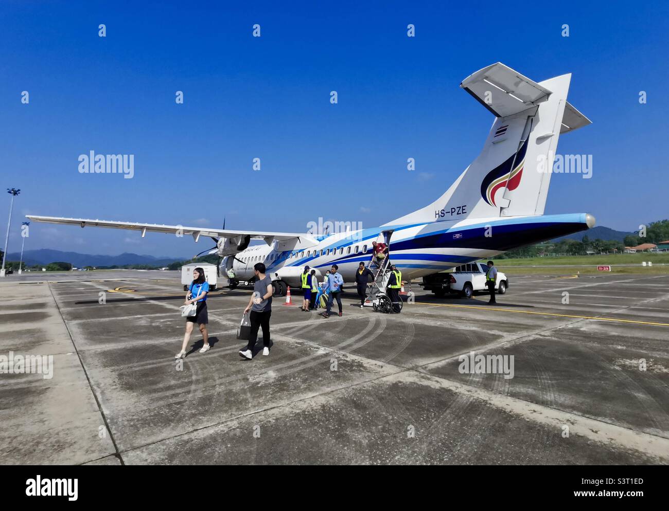 A small Bangkok Air plane at the Mae Hong Song airport, Thailand. - Smartphone Captured Stock Image