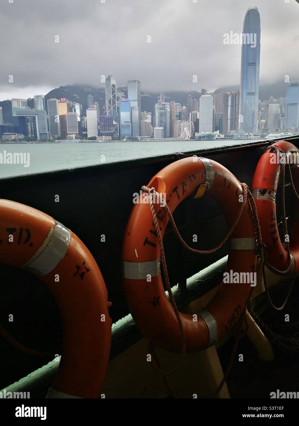 Riding on the Star Ferry in Hong Kong. Stock Photo