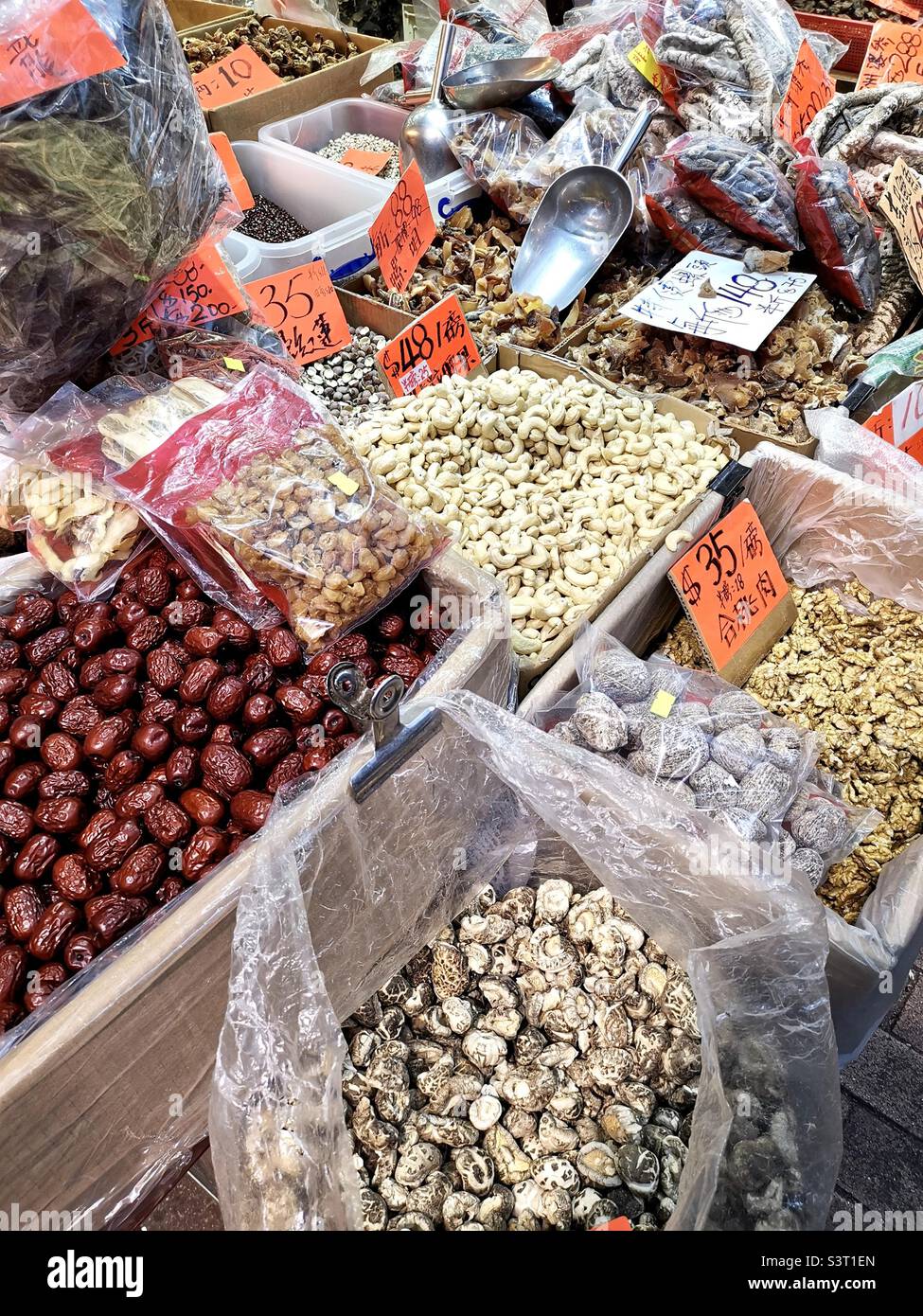 Dried seafood and nuts at a market in Hong Kong. Stock Photo