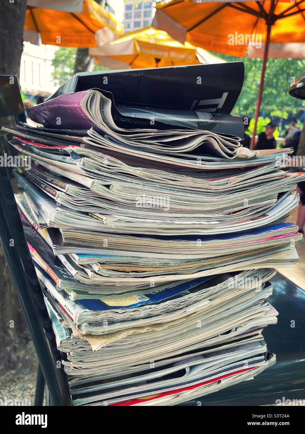 Magazines stacked and ready for display at the outdoor reading room in ...