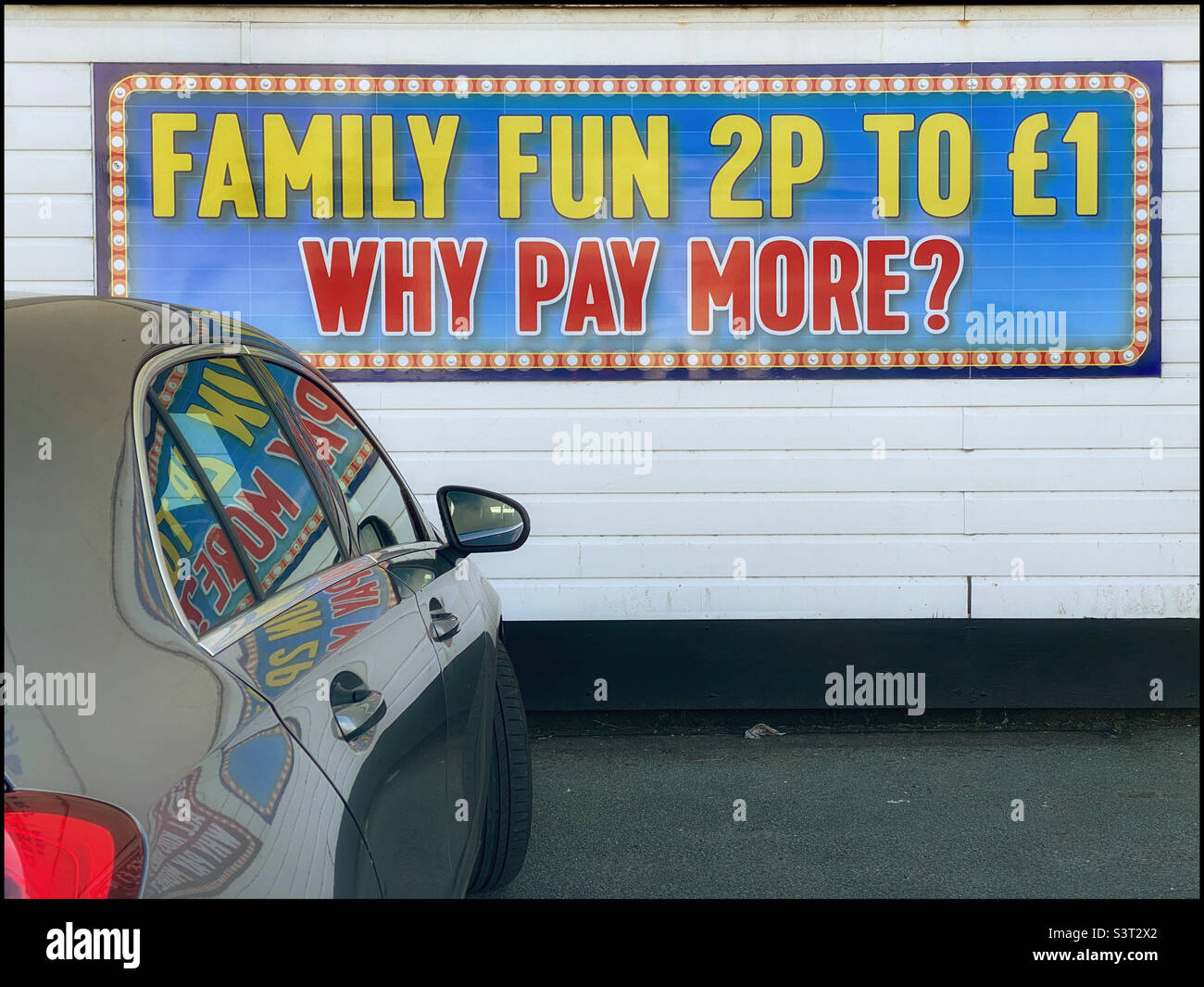 FAMILY FUN 2p TO £1.  WHY PAY MORE? Photo ©️ COLIN HOSKINS. Stock Photo