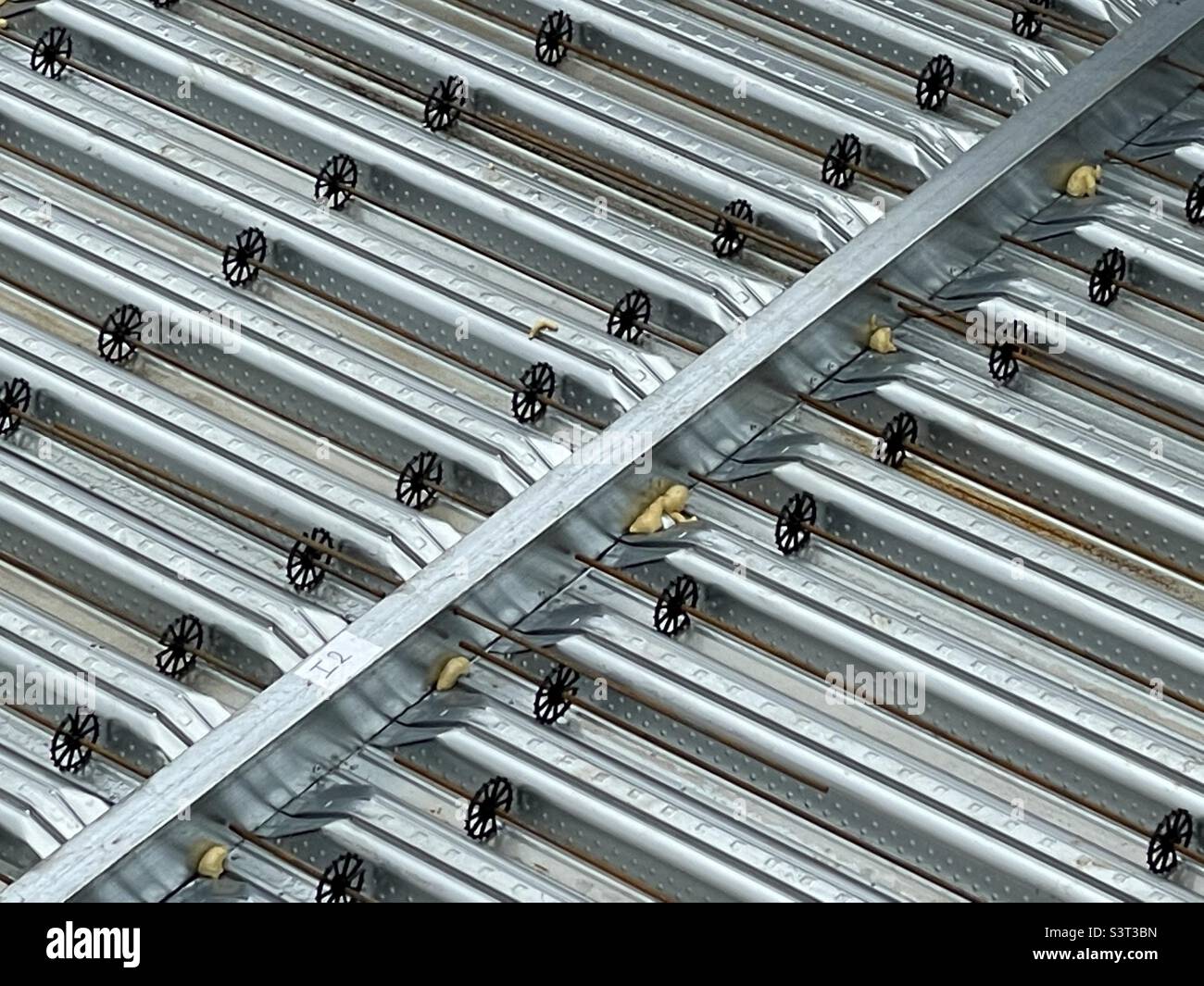 The galvanised metal beams on a half completed building in Worcester UK - Smartphone Captured Stock Image