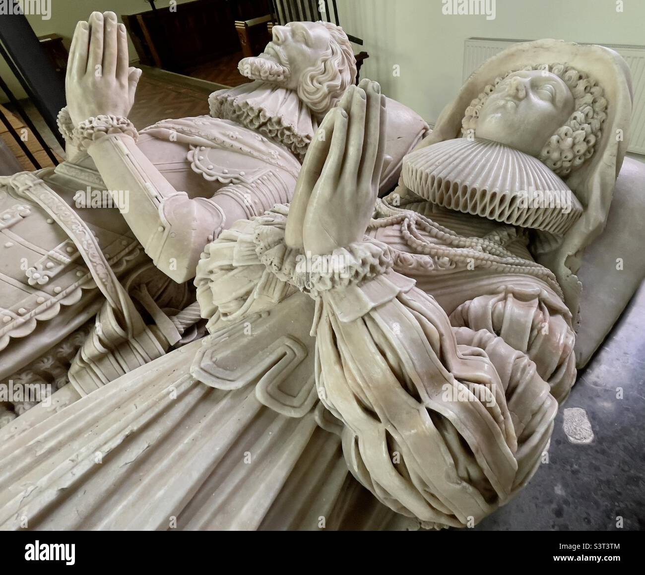 A pair of alabaster figures representing Sir John Kyrle and his wife Sybil in the parish church of Much Marcle In Herefordshire - Smartphone Captured Stock Image