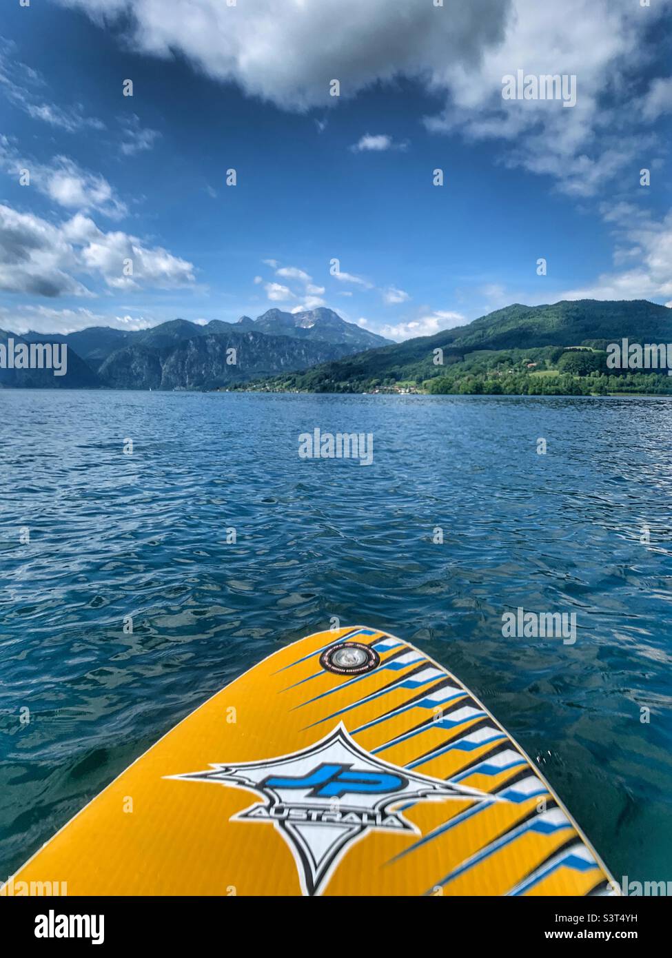 Stand up paddle boarding on lake Attersee in Austria Stock Photo Alamy