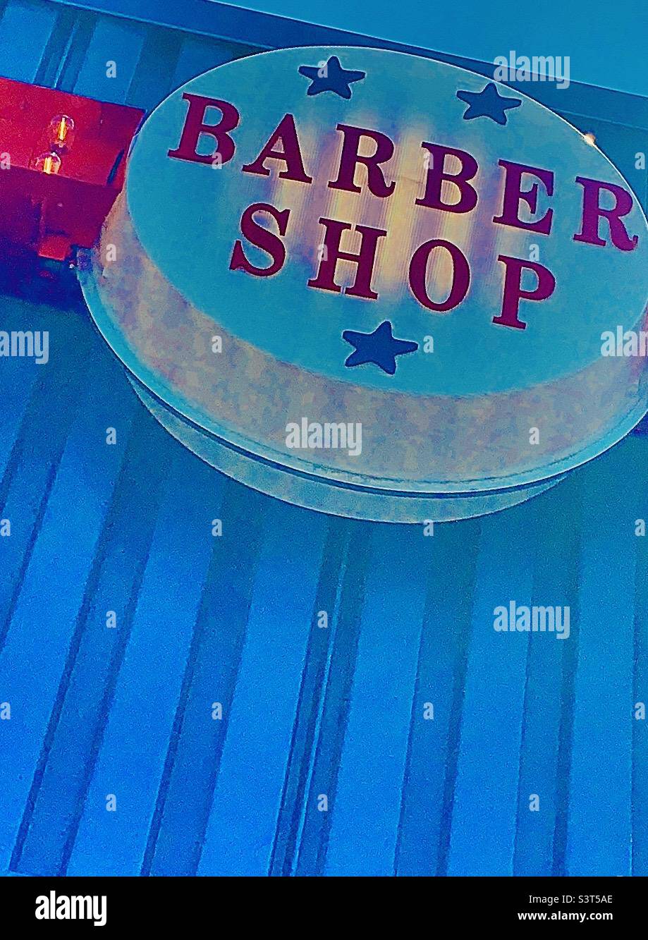 Red and blue circular barbershop sign Stock Photo