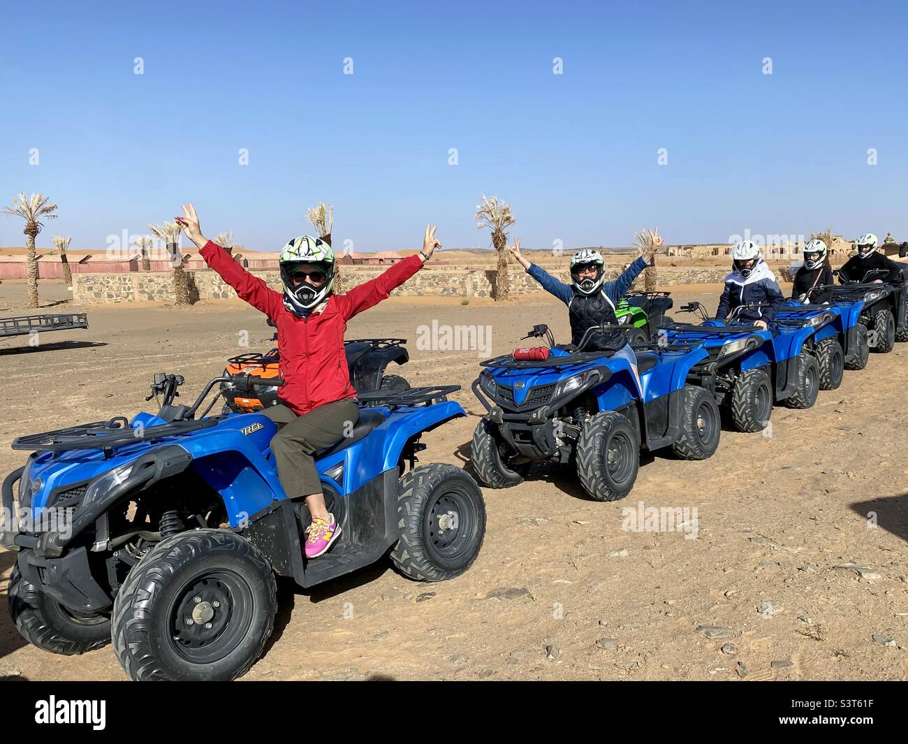 Group of tourists for guided ATV tour in the Moroccan desert, Morocco, North Africa - Smartphone Captured Stock Image