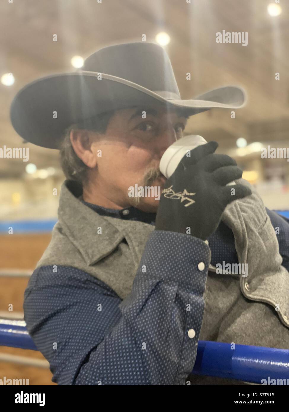 Cowboy coffee chug between rides Stock Photo Alamy