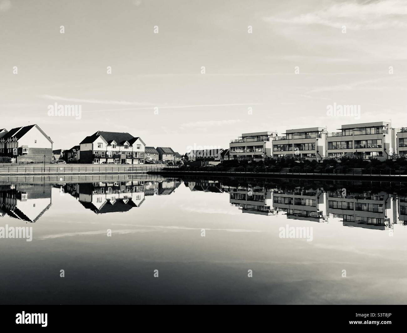 Houses at Sovereign Harbour on a still, summer morning - Smartphone Captured Stock Image