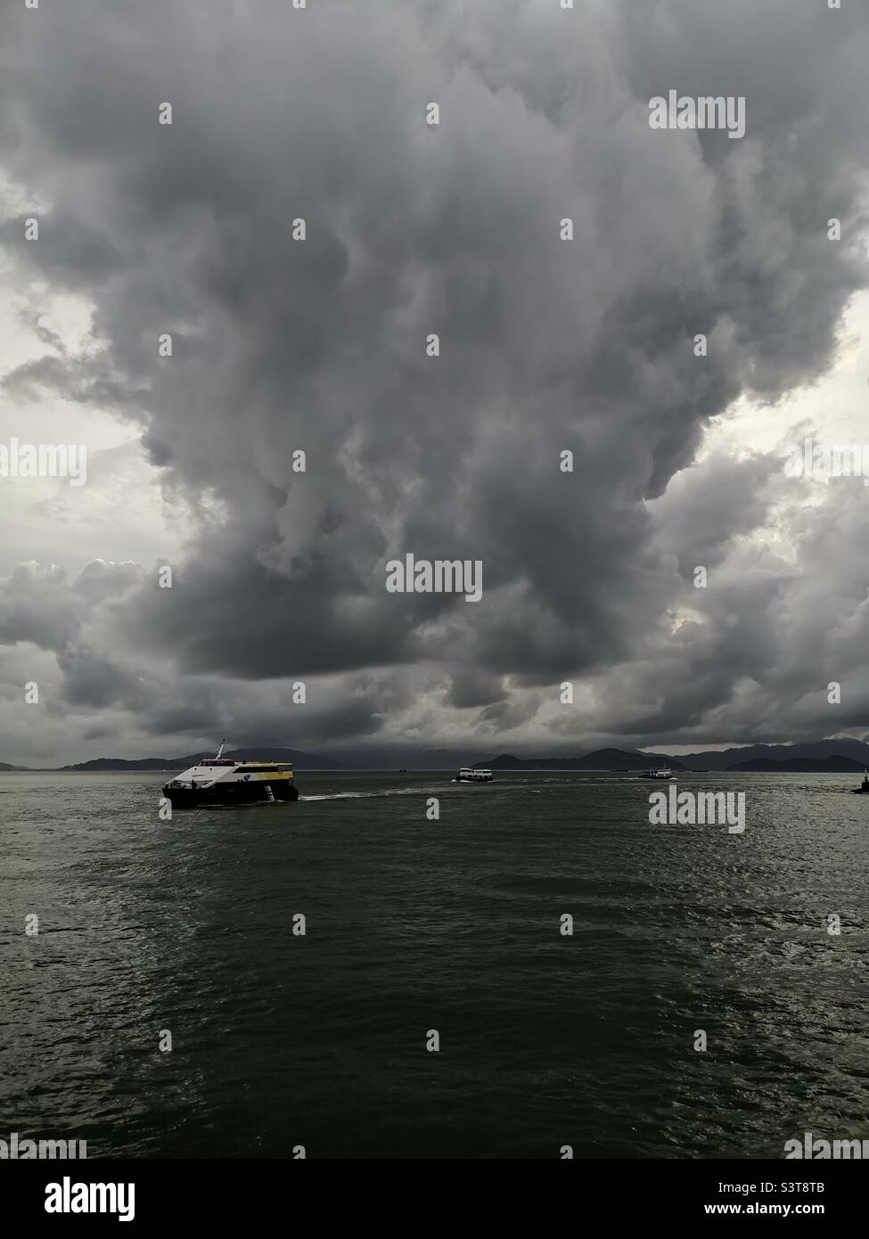 Menacing clouds over the West Lamma channel in Hong Kong. - Smartphone Captured Stock Image