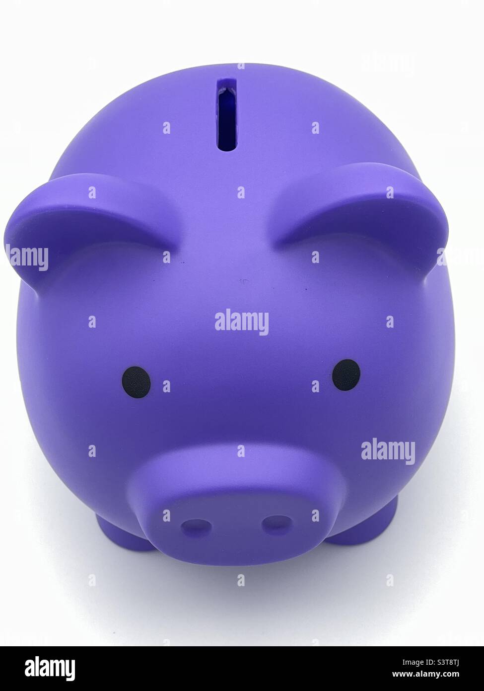 A high view of a purple piggy bank. - Smartphone Captured Stock Image