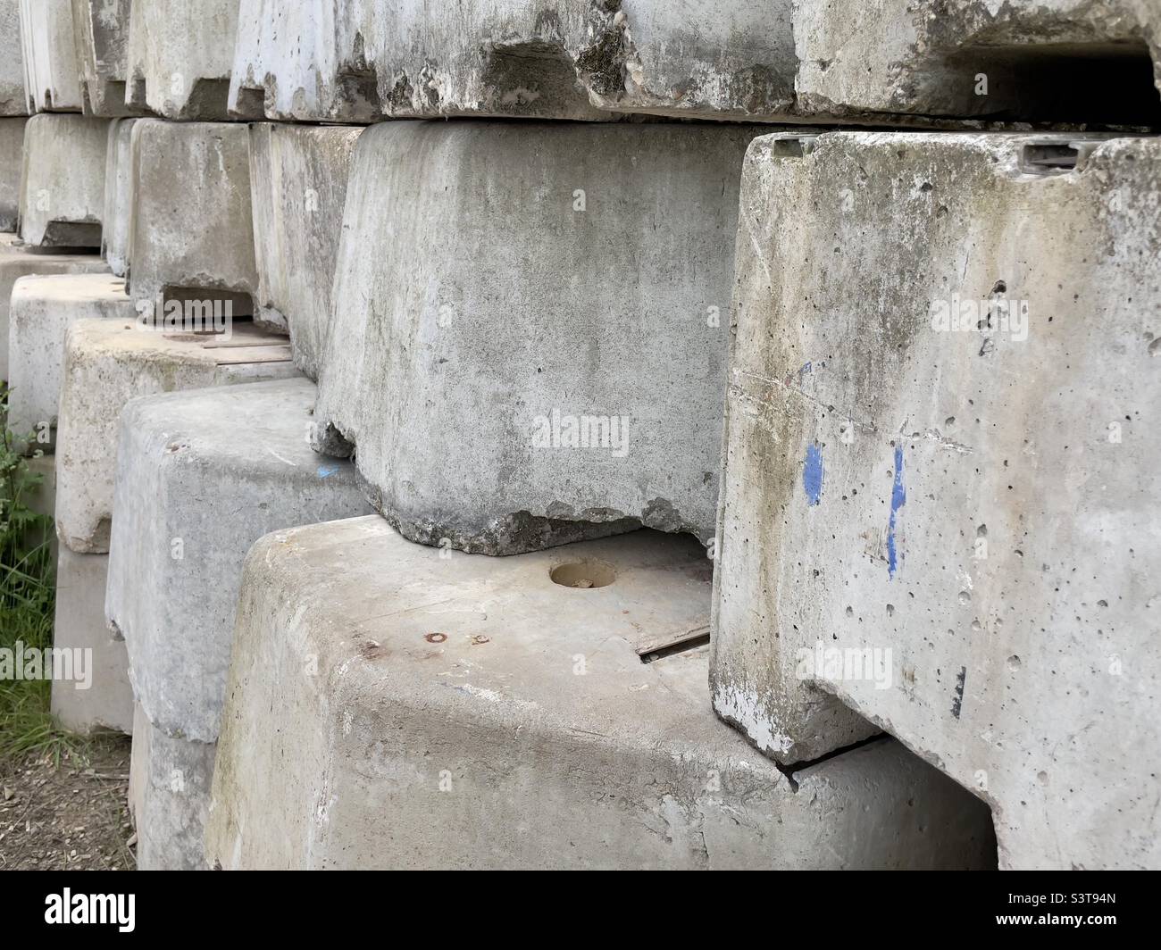 A stack of concrete blocks part of the industrial activity around Diglis island in Worcester UK - Smartphone Captured Stock Image