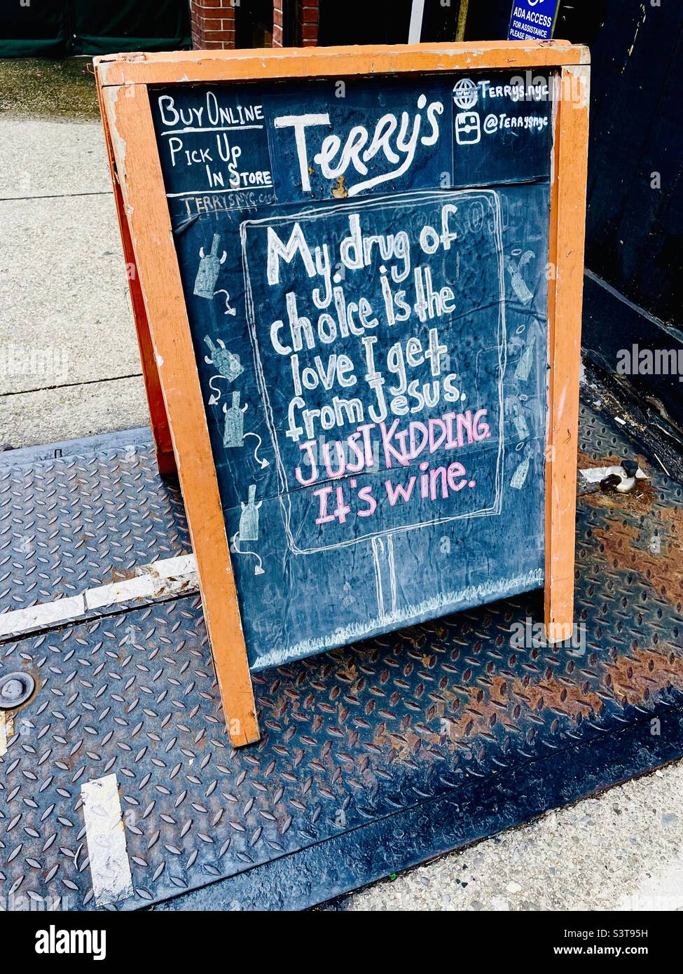 Funny chalkboard sign in New York City - Smartphone Captured Stock Image