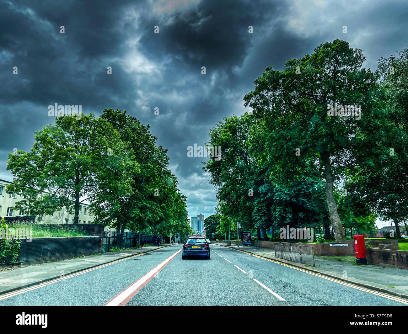 Bury New Road into Manchester City centre during stormy skies Stock Photo