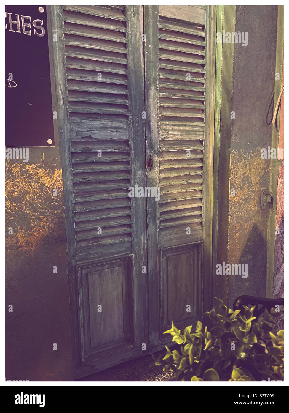Green shutters of a villa in Mallorca Stock Photo