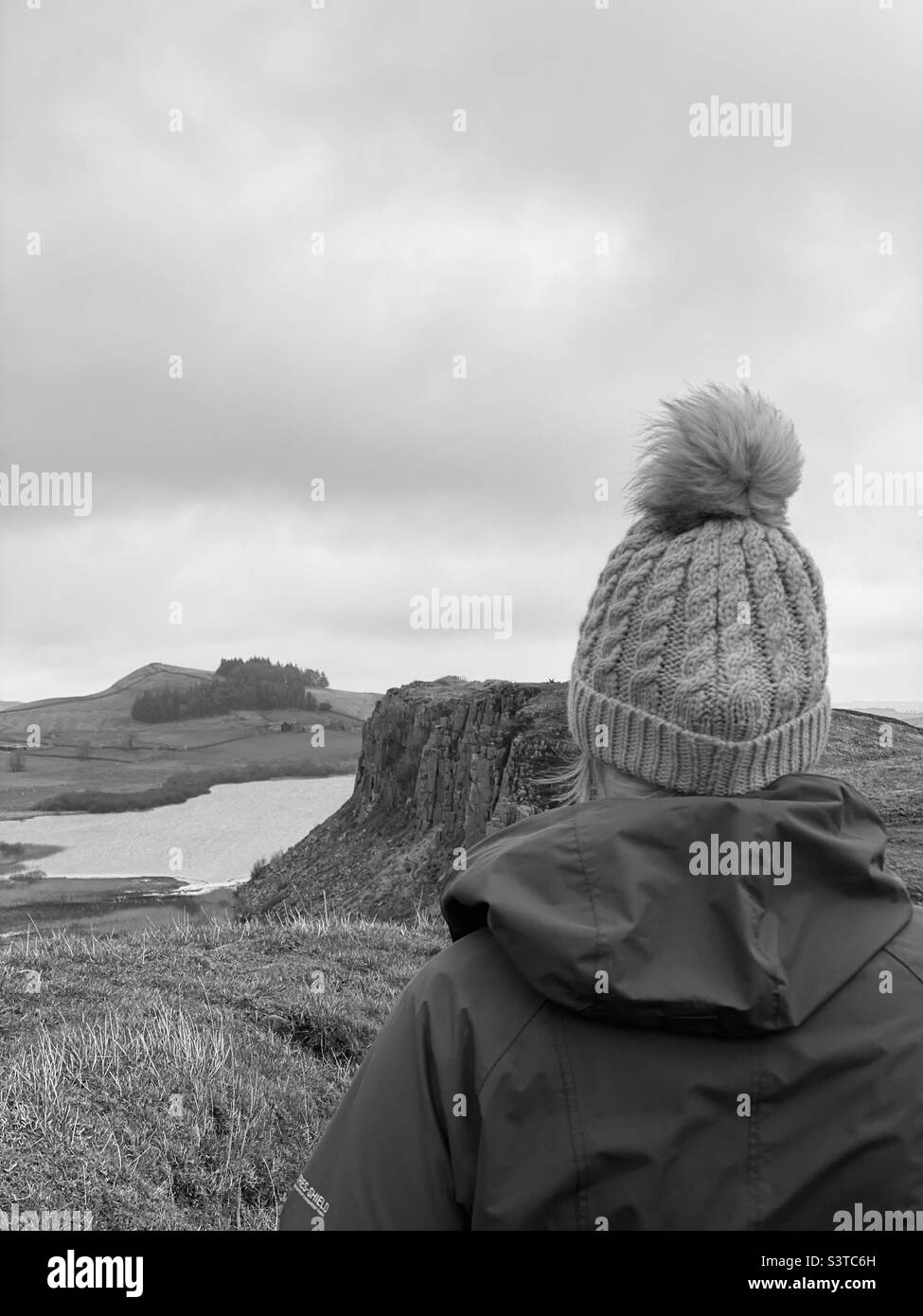 Rear view of woman wearing a knit hat Stock Photo