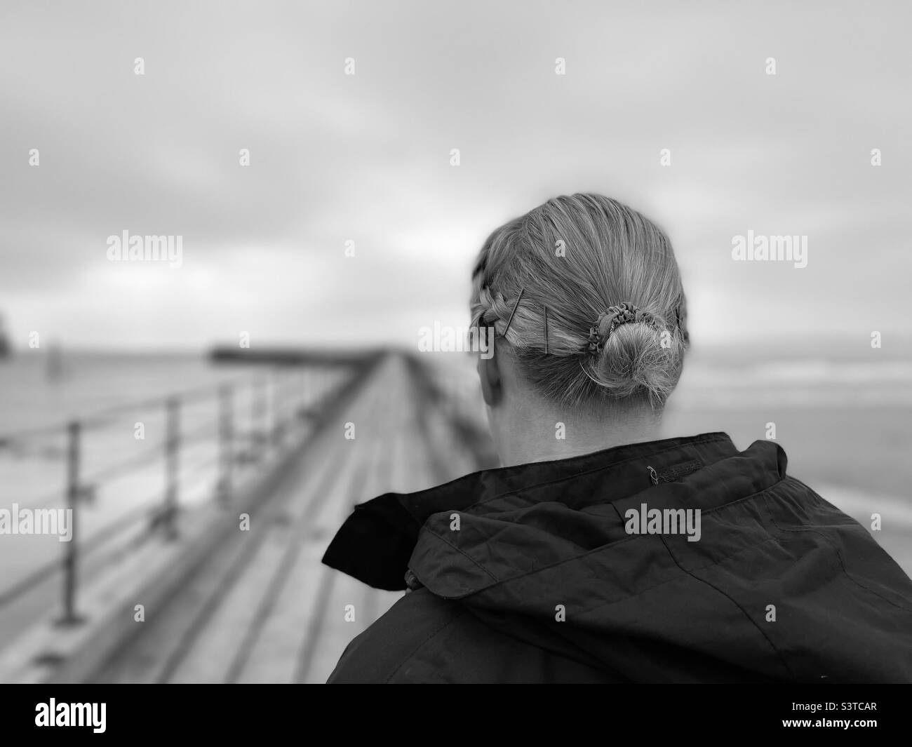 Person pier rear view Black and White Stock Photos & Images - Alamy