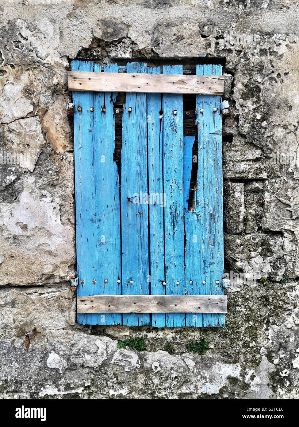 blue wooden window shutters in Camargue Stock Photo