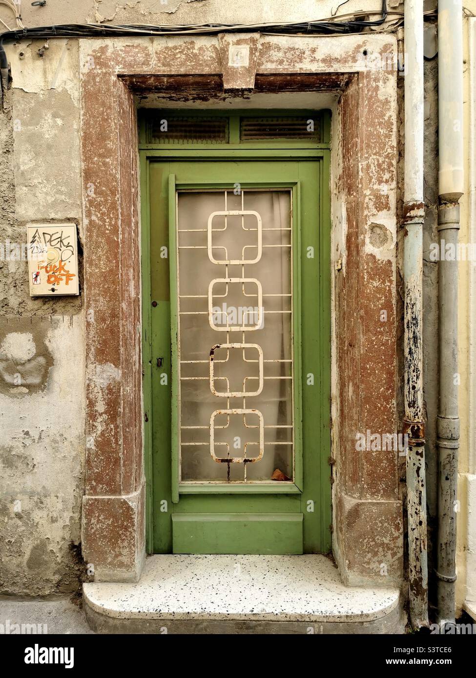 green wooden door in Camargue Stock Photo
