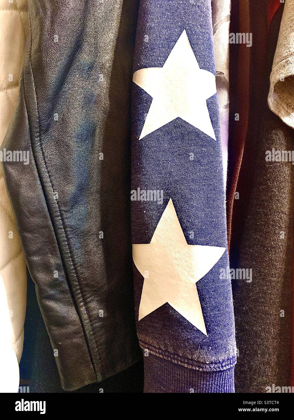 Fourth of July jacket with white stars on blue sleeve Stock Photo