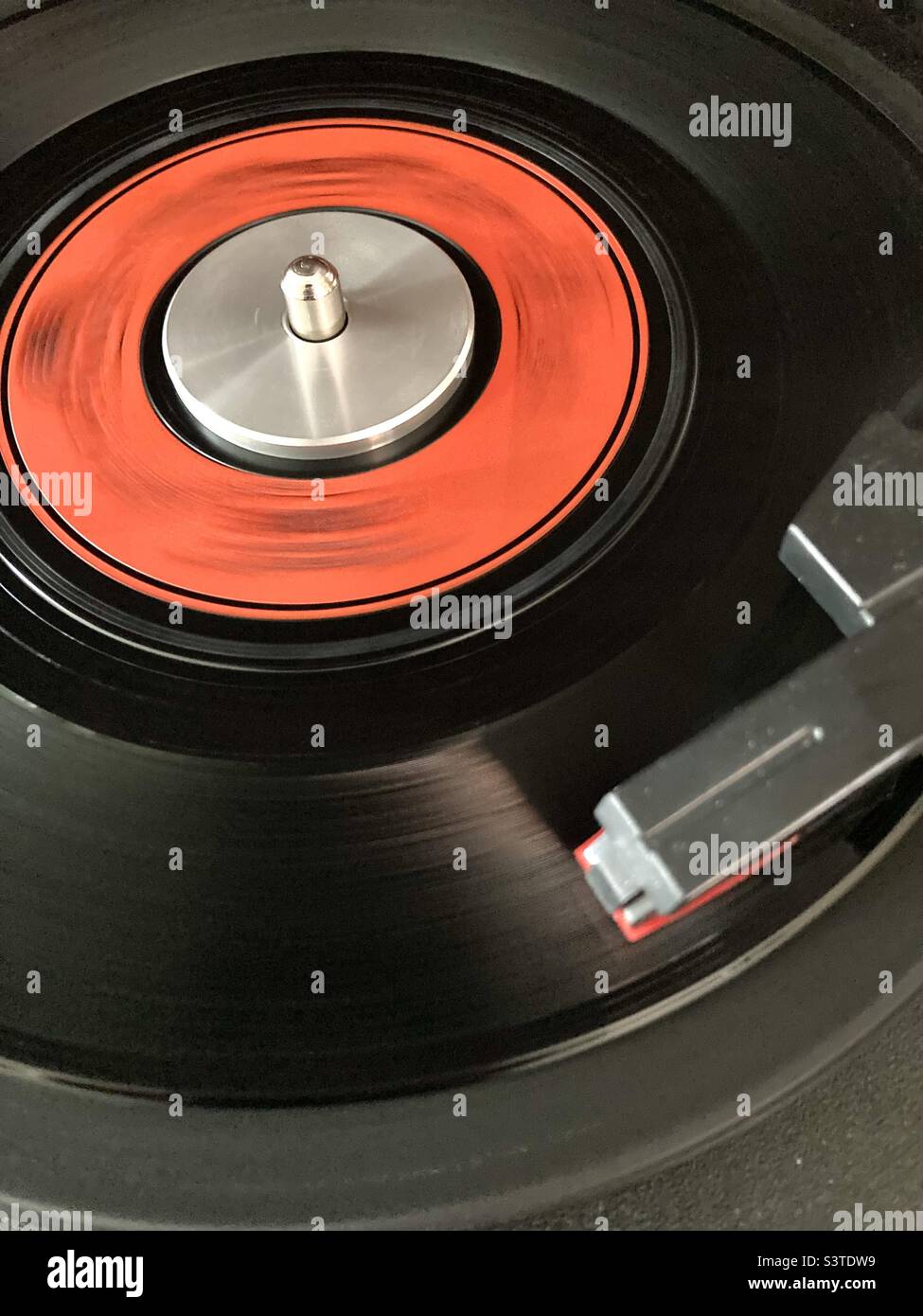 Vinyl record spinning on a turntable Stock Photo