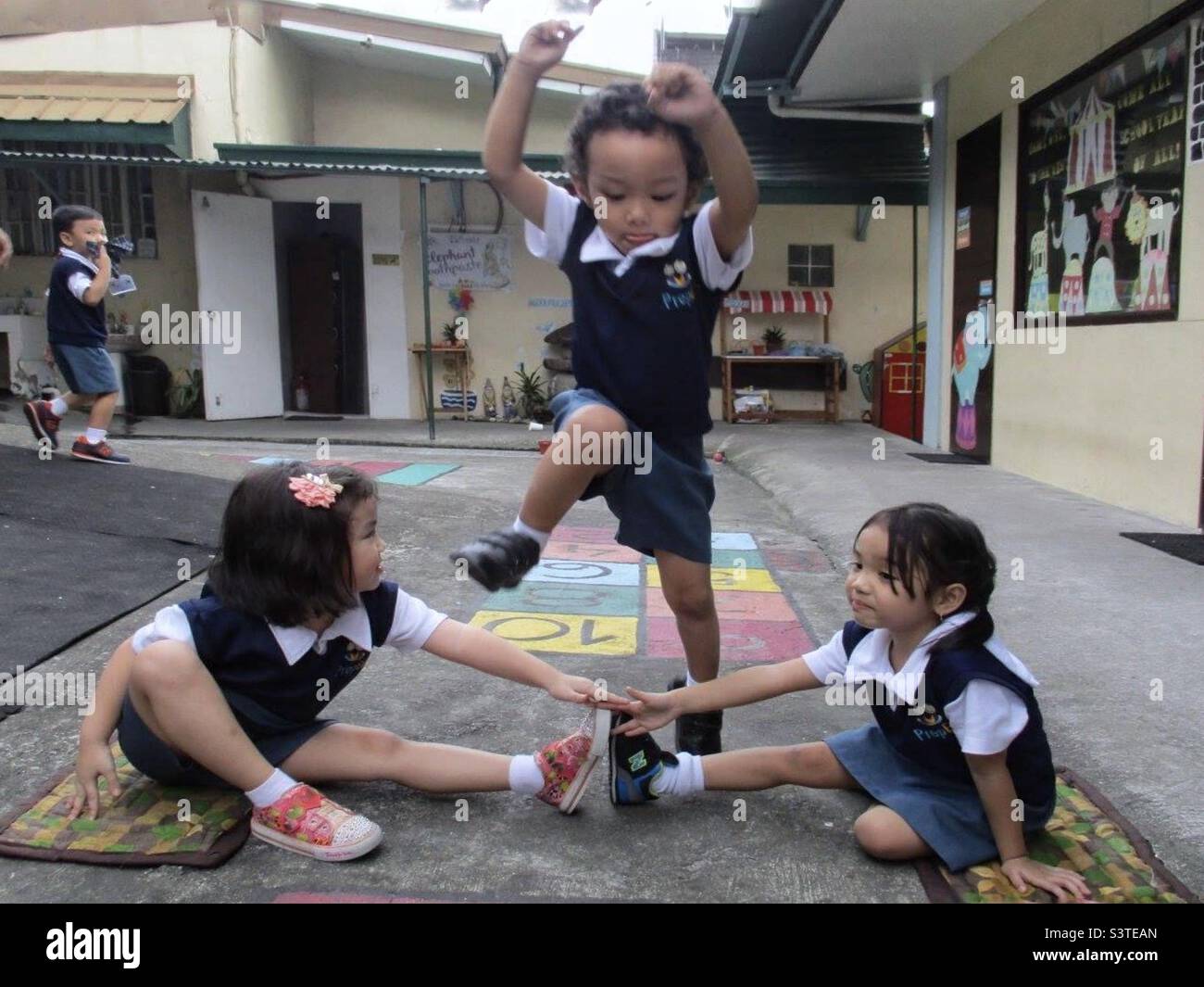 Jump at thorns a popular Filipino outdoor games called luksong Tinik
