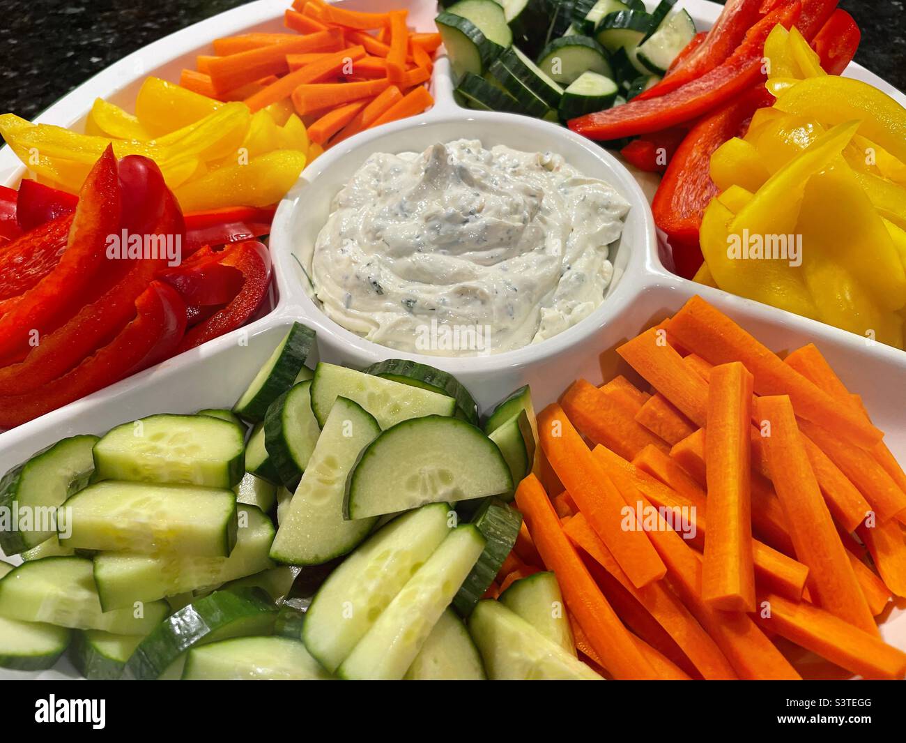 Close up of a vegetable platter with homemade dip, 2022, USA - Smartphone Captured Stock Image