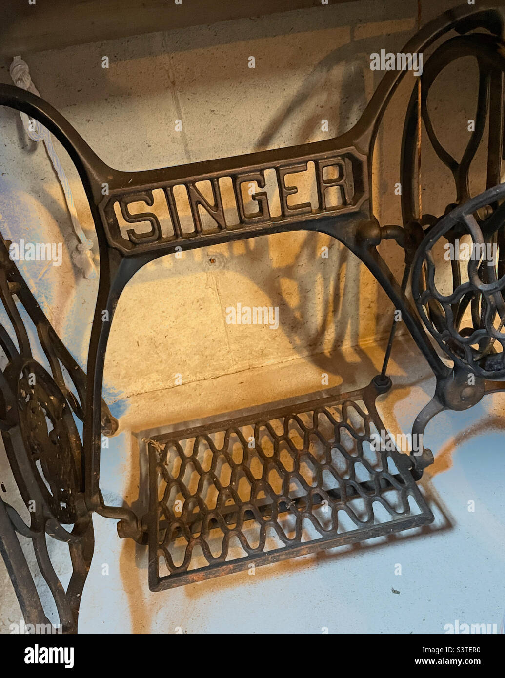 Treadle of an antique manual singer sewing machine, 2022, USA - Smartphone Captured Stock Image