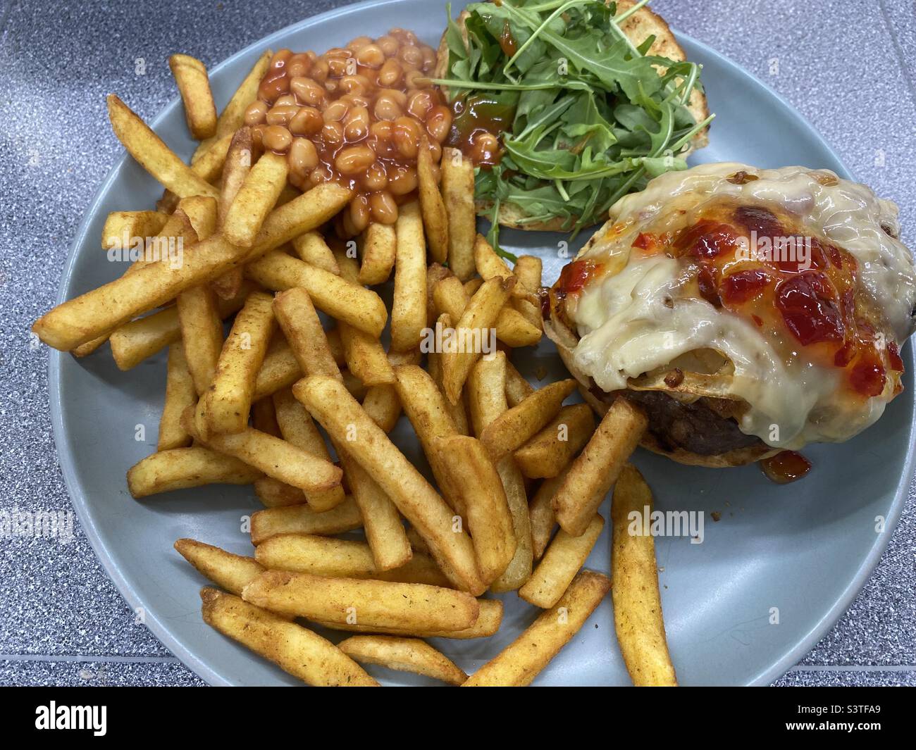 Homemade Spicy Cheese Burger, Chilli Jam, Cajian Fries, Rocket, on a