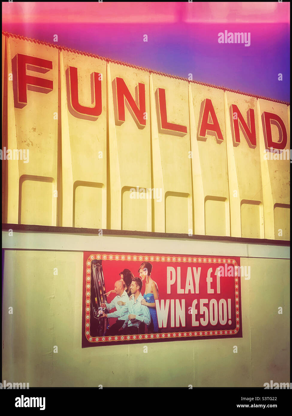 FUNLAND - a retro film effect look of the exterior of an English gambling arcade. Winning money is fun! PLAY £1 and (probably not) WIN £500. Photo Credit ©️ COLIN HOSKINS. Stock Photo