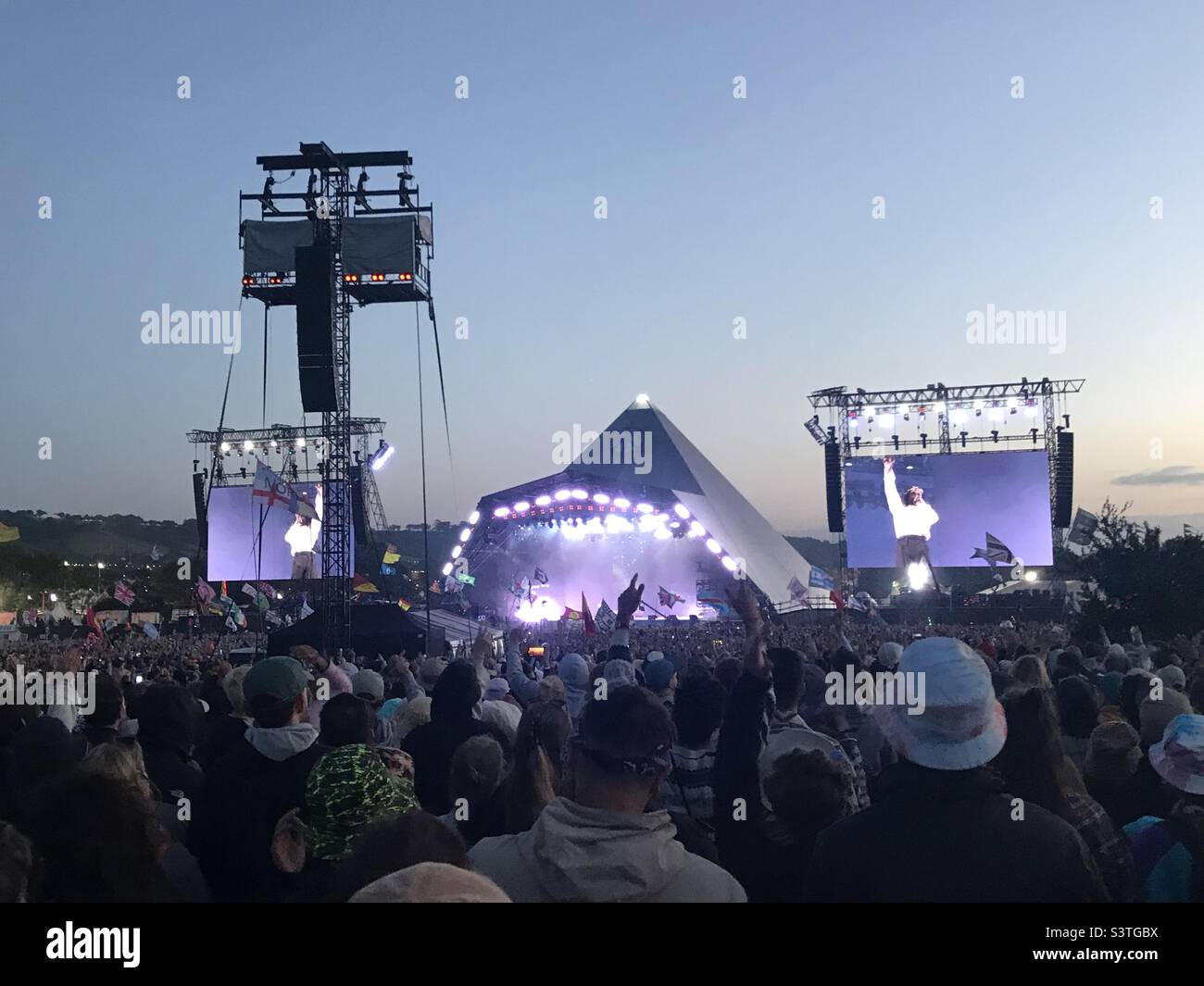 The iconic Pyramid Stage at the Glastonbury Festival 2022 during the Kendrick Lamar headline set. - Smartphone Captured Stock Image