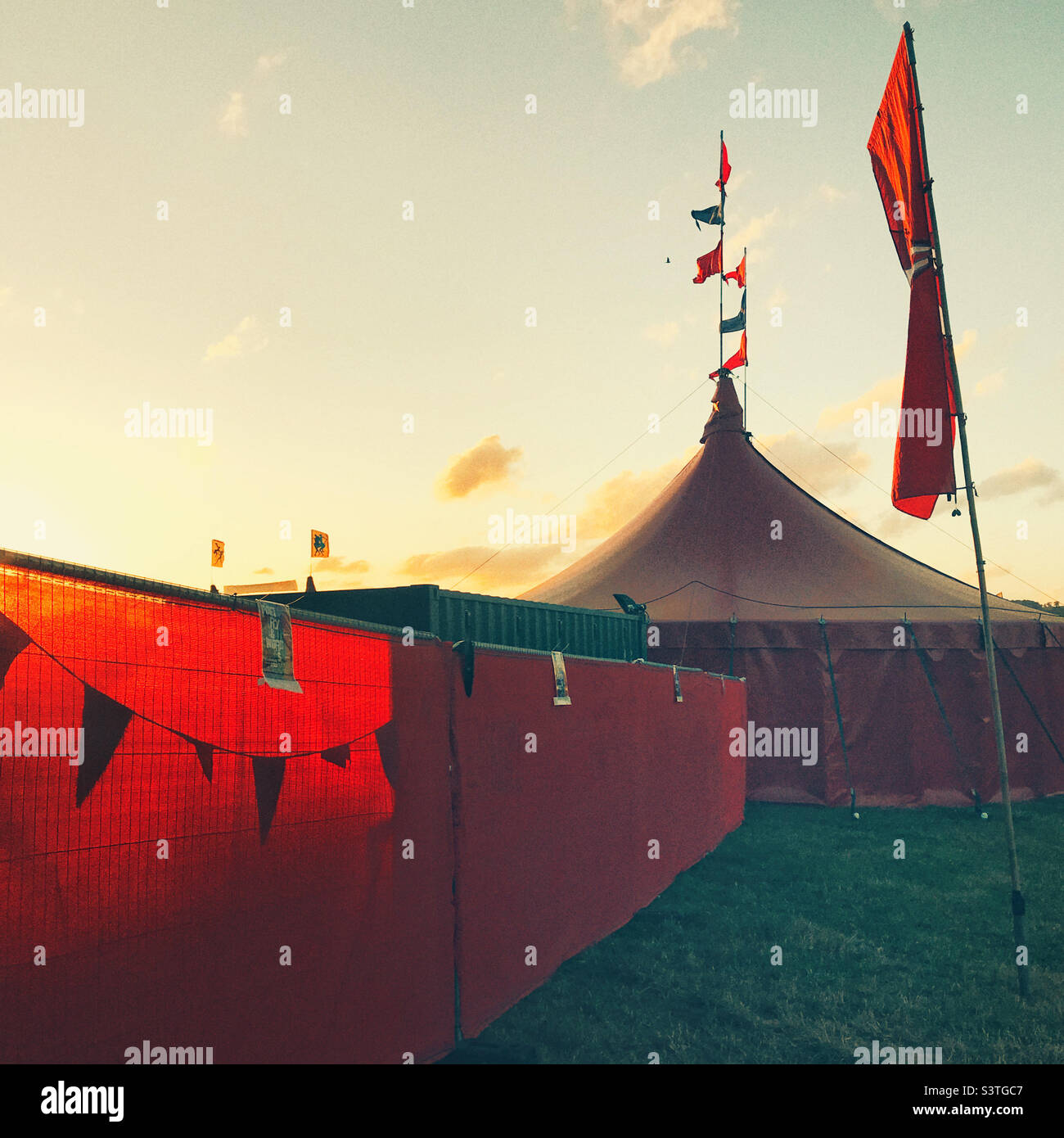 Big Tent at the Glastonbury Festival 2022 in beautiful warm evening sunshine Stock Photo
