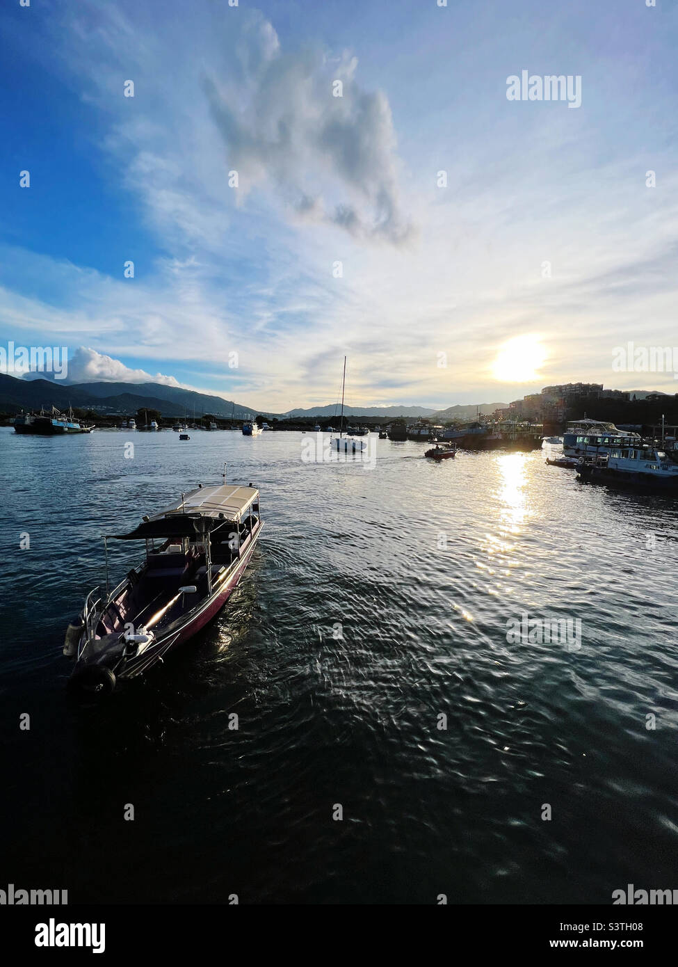 Sunset fishing port - Smartphone Captured Stock Image