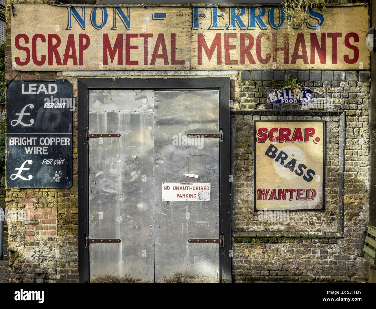 Vintage signs at the entrance of Electrowerkz bar and entertainment venue in Torrens Street, London. UK - Smartphone Captured Stock Image
