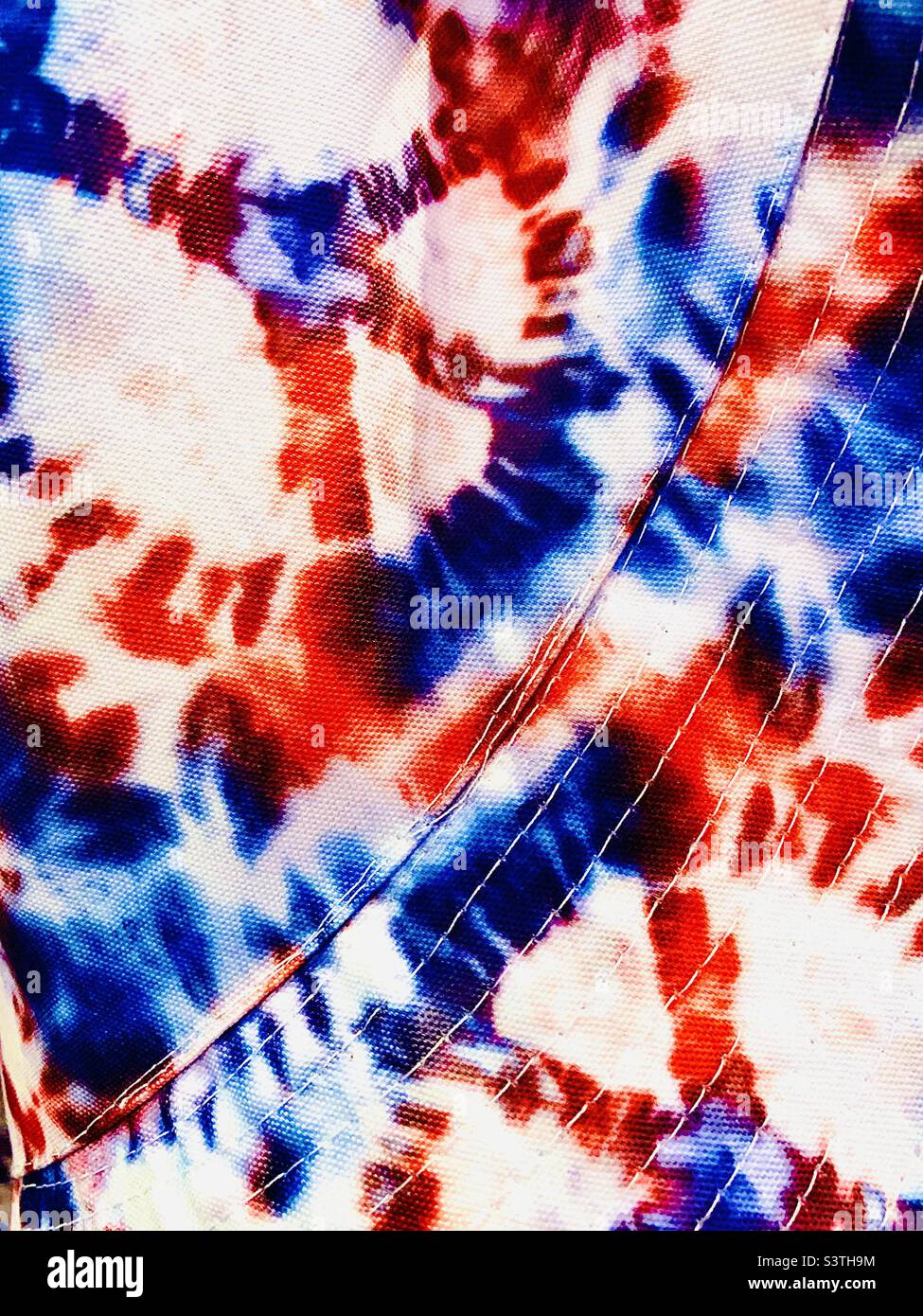 Red, white, and blue tie dyed peace sign fabric Stock Photo