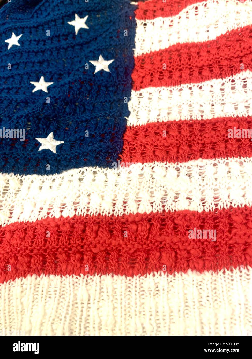 4th of July American flag sweater textured fabric Stock Photo
