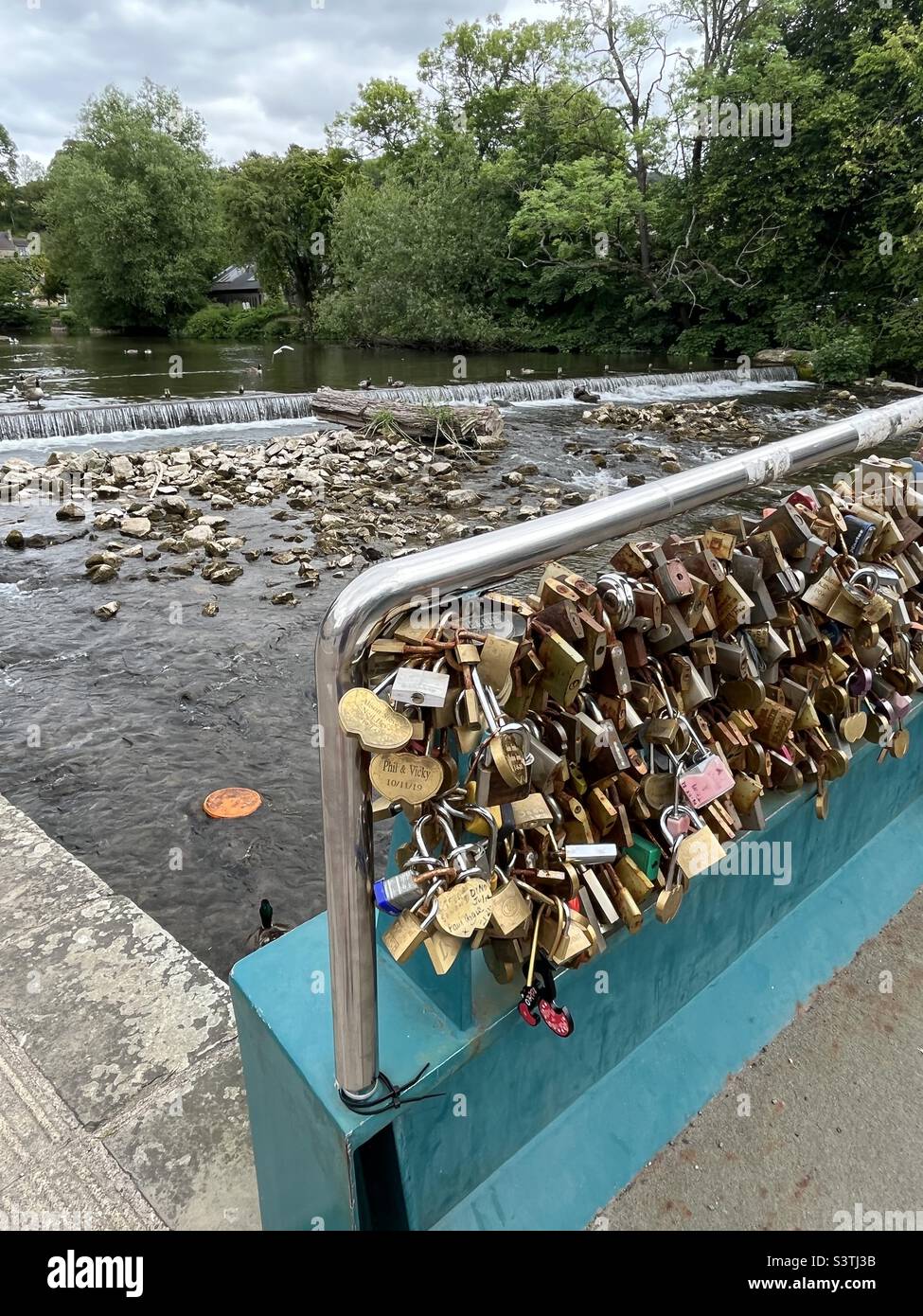 Love Locks attached to bridge over the River Wye in Bakewell, Peak District - Smartphone Captured Stock Image