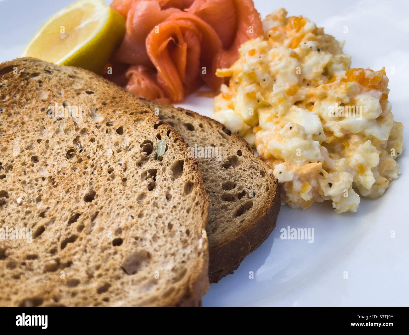 Smoked salmon and scrambled eggs for breakfast - Smartphone Captured Stock Image