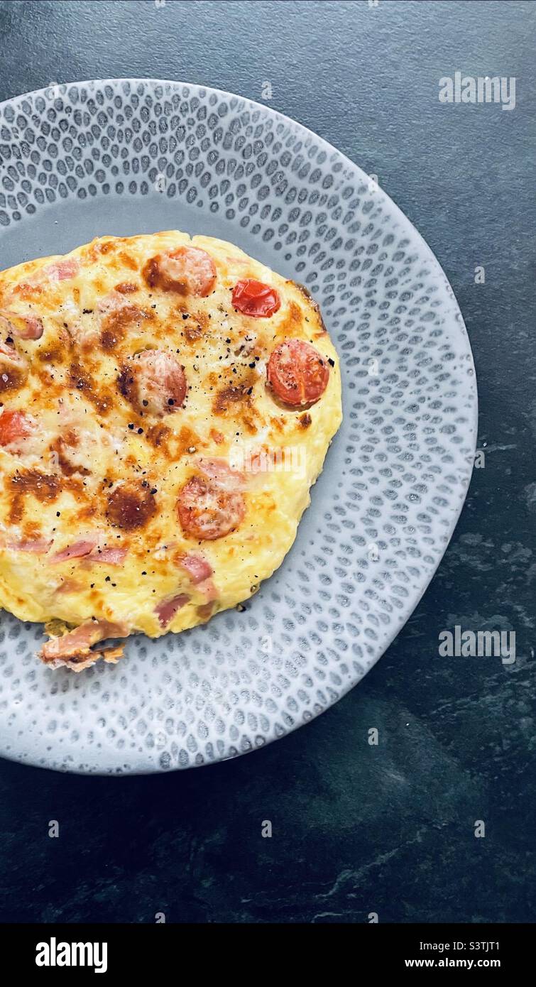 Ham, cheese and tomato omelette Stock Photo Alamy