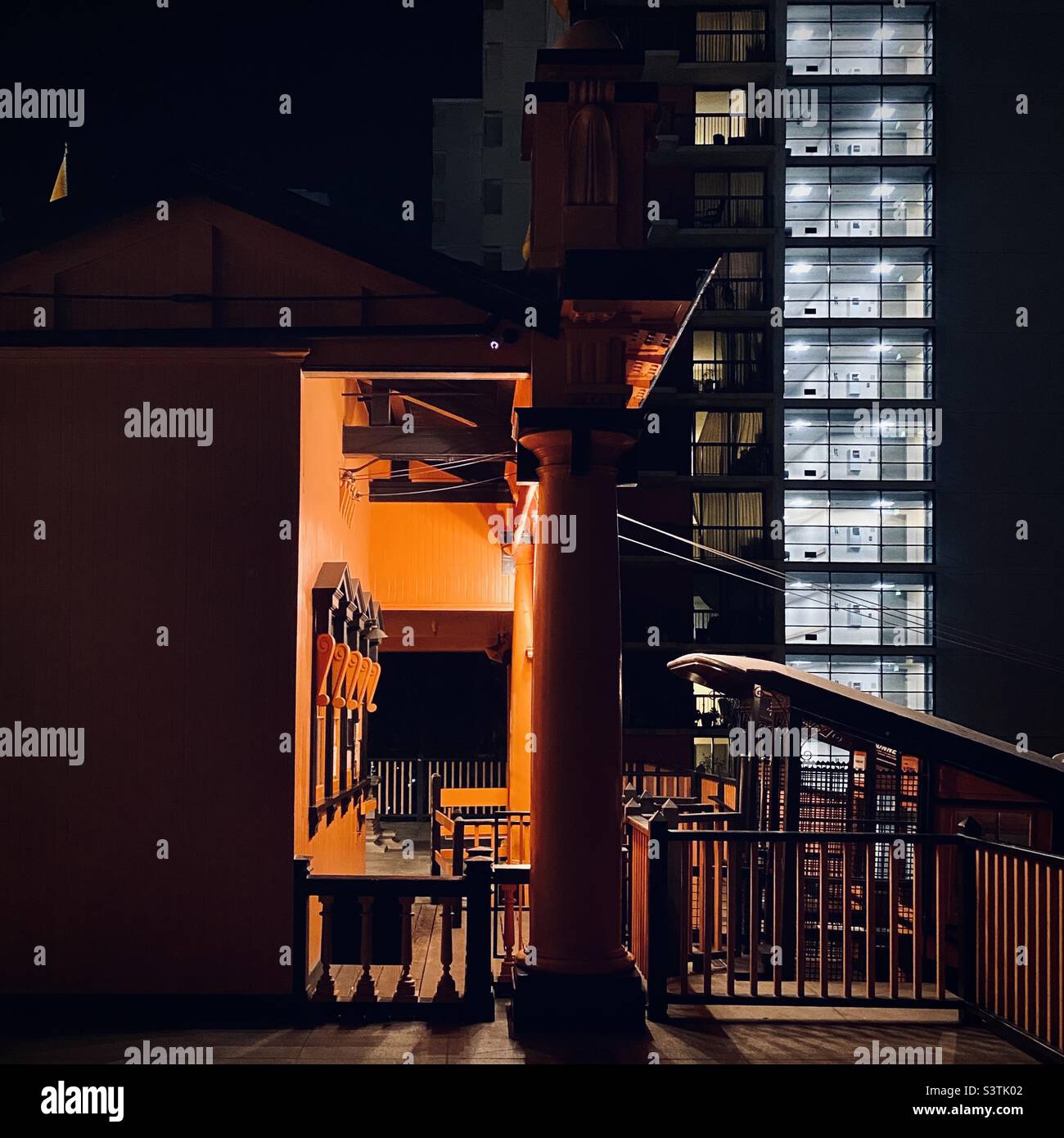 LOS ANGELES, CA, SEP 2021: night view of orange ticket office at top of Angels' Flight funicular railway in Downtown with illuminated stairs and elevator lobby of apartment building in background - Smartphone Captured Stock Image