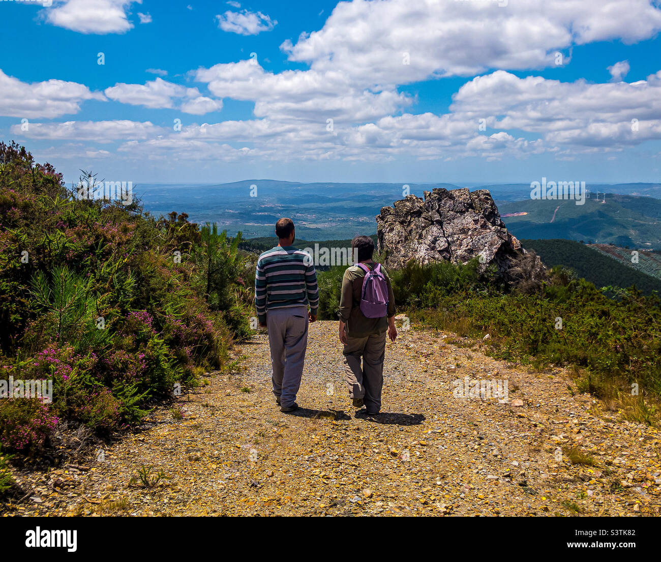 2 hikers enjoy the view while walking the trail near Sao Joao do Deserto, Penela, Central Portugal - Smartphone Captured Stock Image