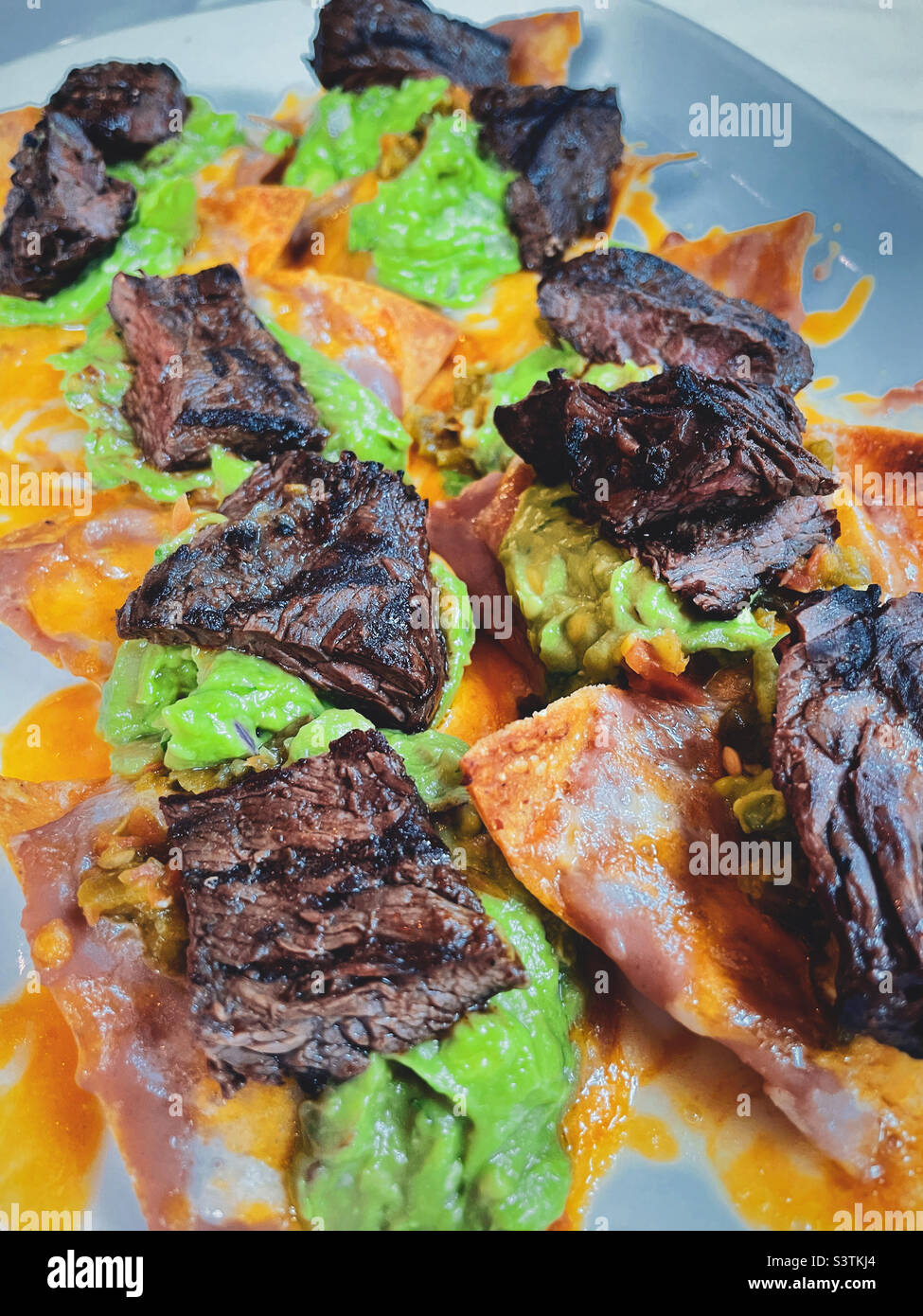 Steak nachos and guacamole served at an upscale Mexican restaurant in Murray Hill, 2022, New York City, USA Stock Photo