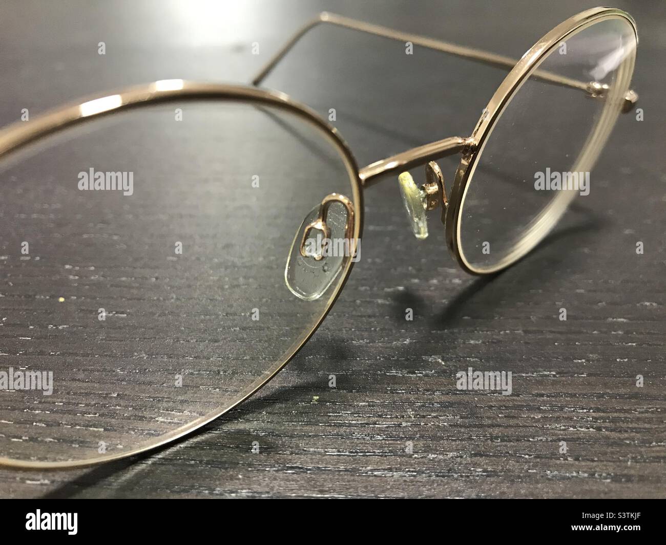 Gold framed glasses hires stock photography and images Alamy