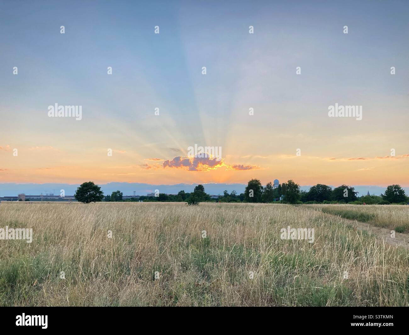 Sunset on Tempelhof airport in July, Berlin, Germany Stock Photo