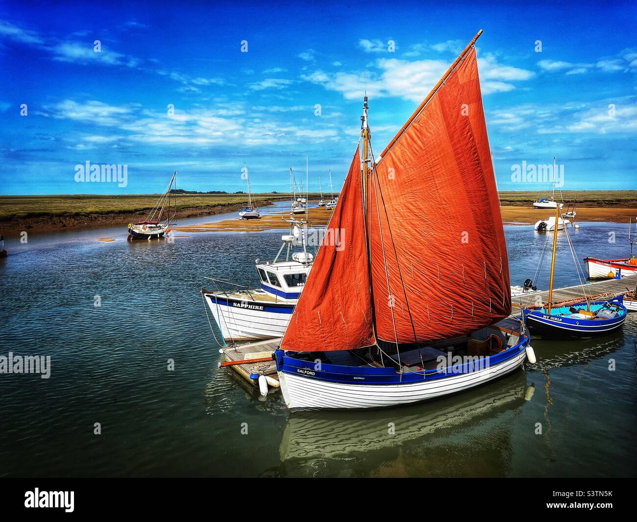 The Salford, a 1950s Kings Lynn Whelk boat, moored at Wells-next-the-Sea, Norfolk, UK. - Smartphone Captured Stock Image