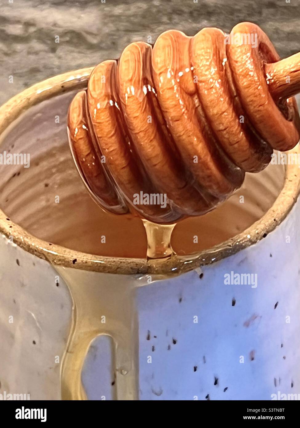 Dripping honey Stock Photo