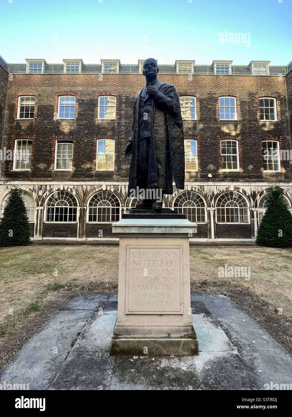 The car manufacturer William Morris became Viscount Nuffield, president, benefactor of Guy's Hospital, London. This statue is in the grounds of the old hospital buildings - Smartphone Captured Stock Image