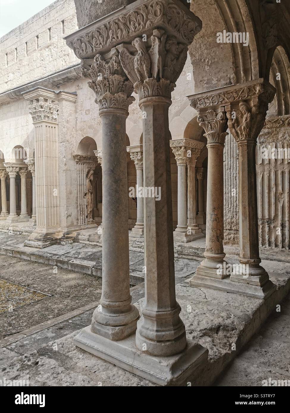 antique columns in Convent courtyard Stock Photo