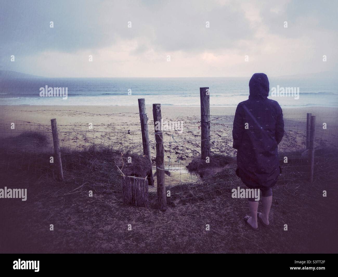 Looking out over the beach on a gloomy overcast day - Smartphone Captured Stock Image