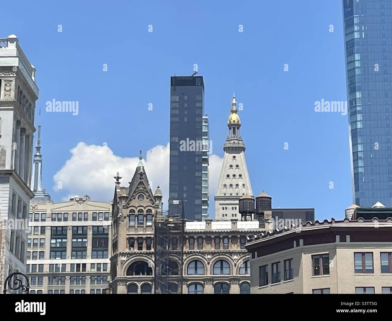 Hey scene of mixed architecture in the buildings of New York City, looking north from Union Square - Smartphone Captured Stock Image