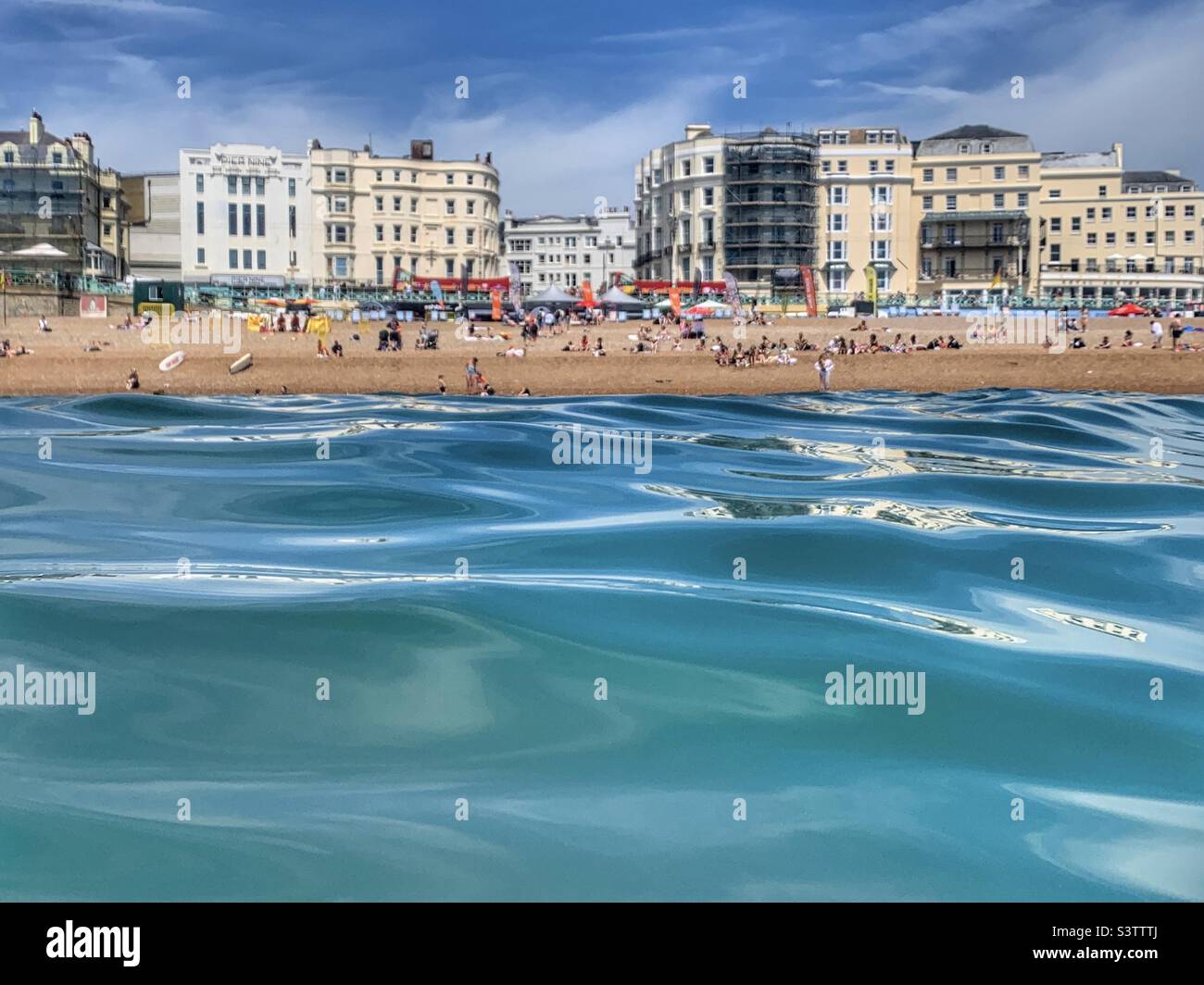 Brighton beach from the sea in summer Stock Photo